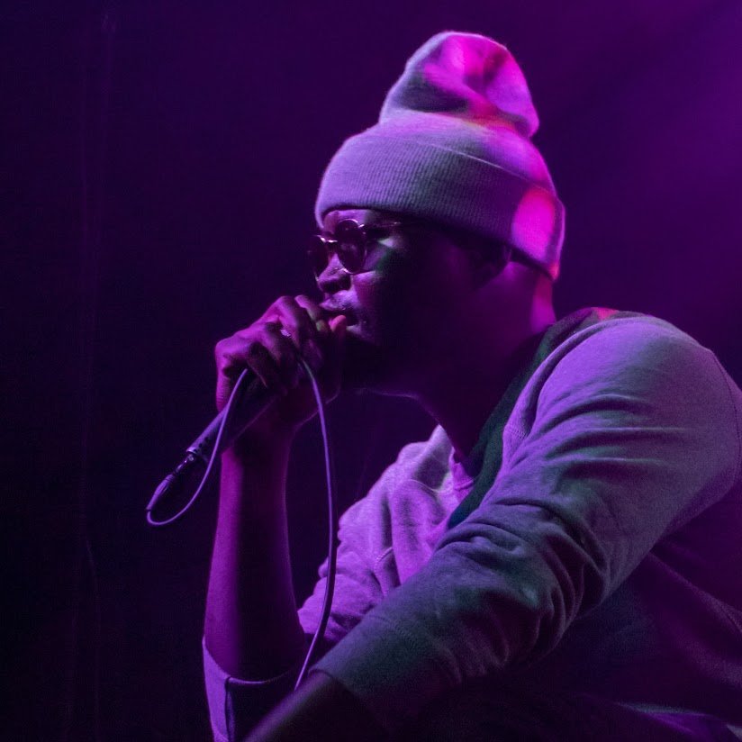 African Dundada stage performance purple glow
