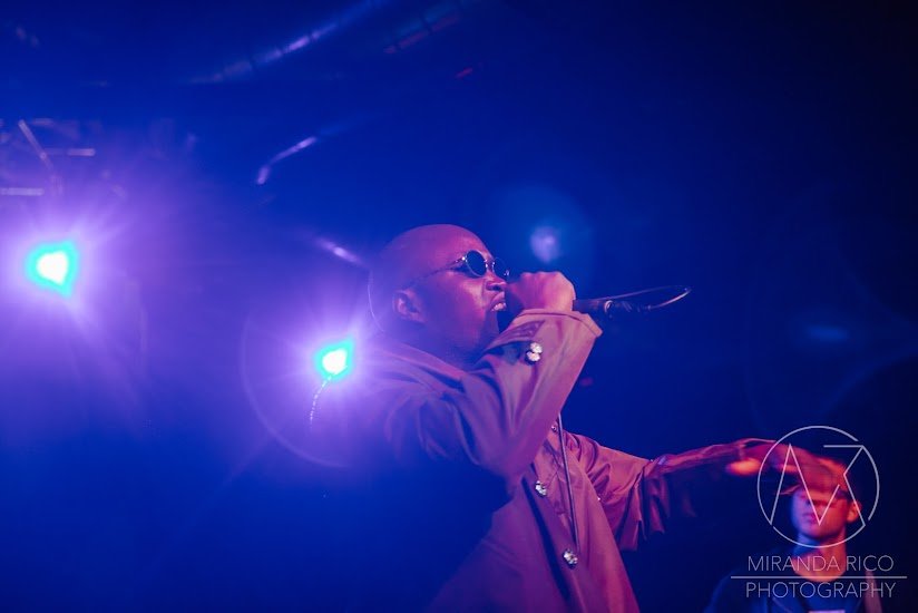 African Dundada on stage under purple lights