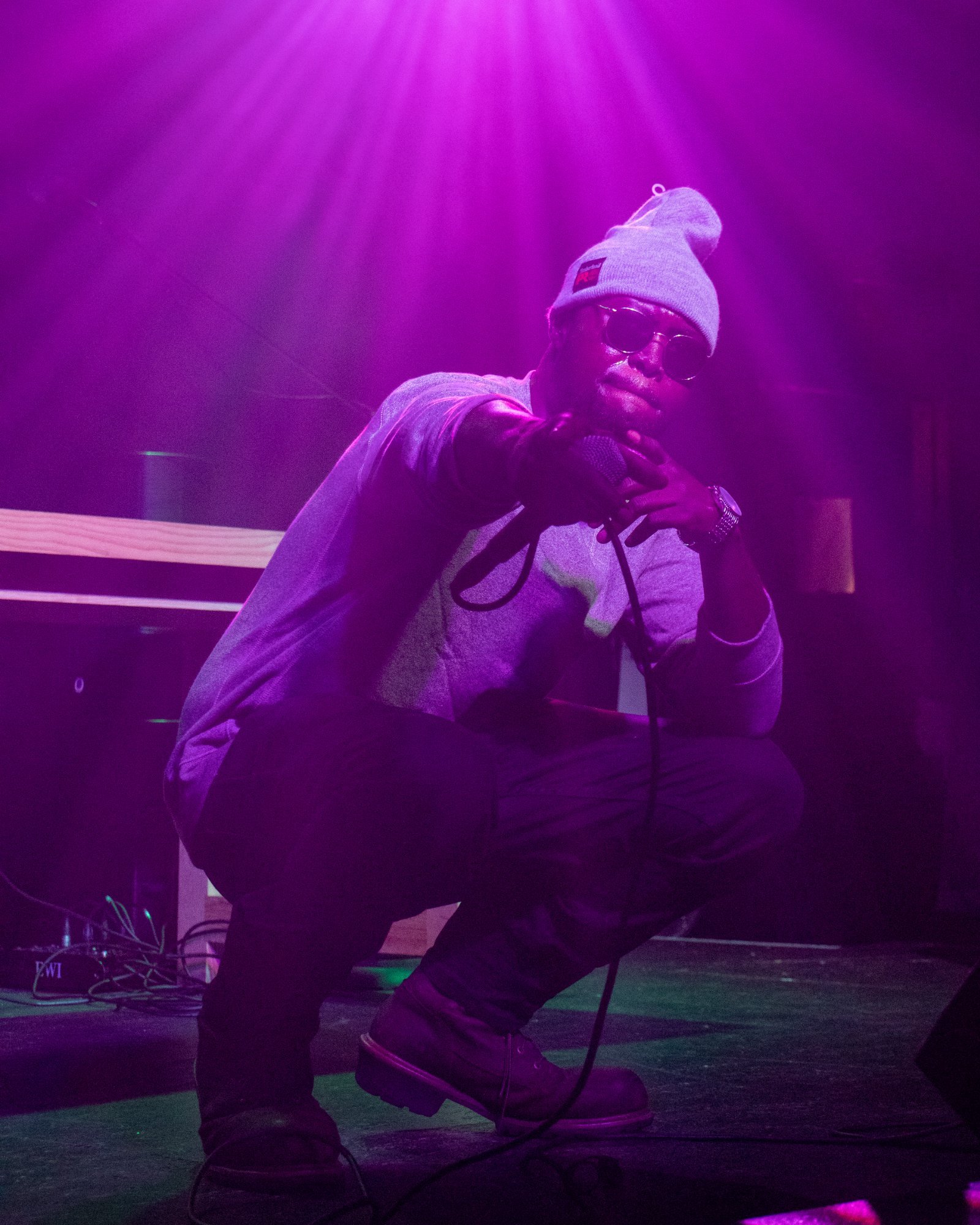 African Dundada — raising hand on stage